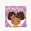  A colorful birthday card with an illustration of a mixed-race girl named Ayana. She has dark curly hair styled in afro puffs and a joyful expression.